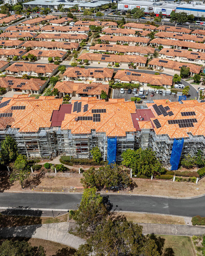 Drone photo of scaffolding around a residential complex at North Lakes by Elite Access Solutions