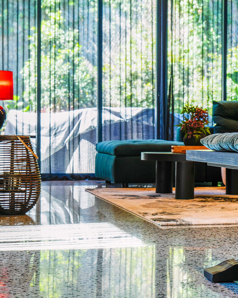 Polished concrete floor through a luxury home in Keperra by McGinn Concrete